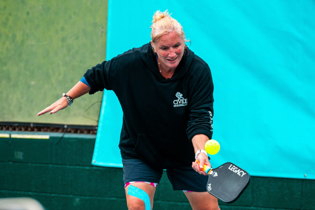 Lee Whitwell hitting a third shot drop